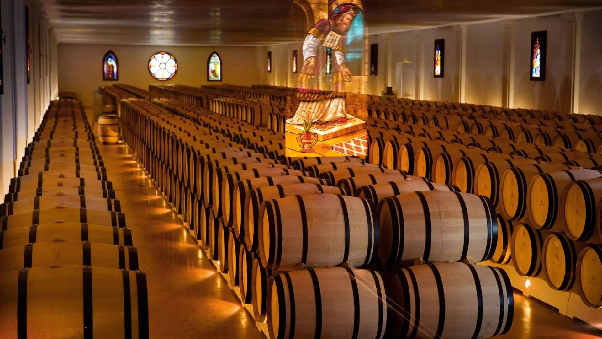A look at the stacked barrels of the Chateau Pape Clement wine cellar. 