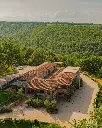 Pomario surrounded by greenery.webp