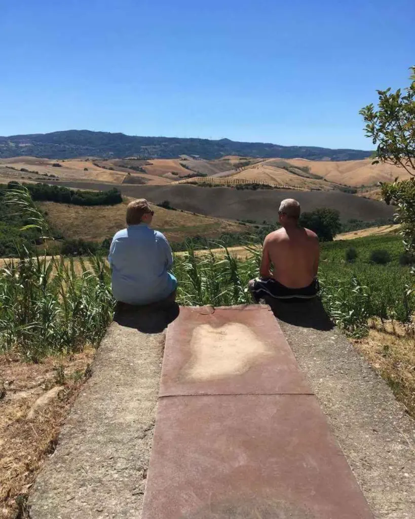 Winetasting among the vineyard  Tuscany Pieve de Pitti experience.webp