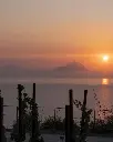 tenuta-di-castellaro-sunset-wine-tasting-lipari-sicily-italy.webp